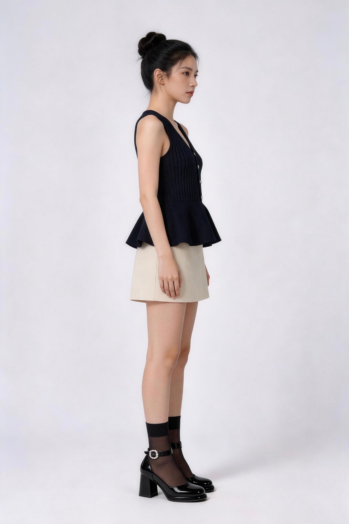 Lunessa Ribbed Peplum Top