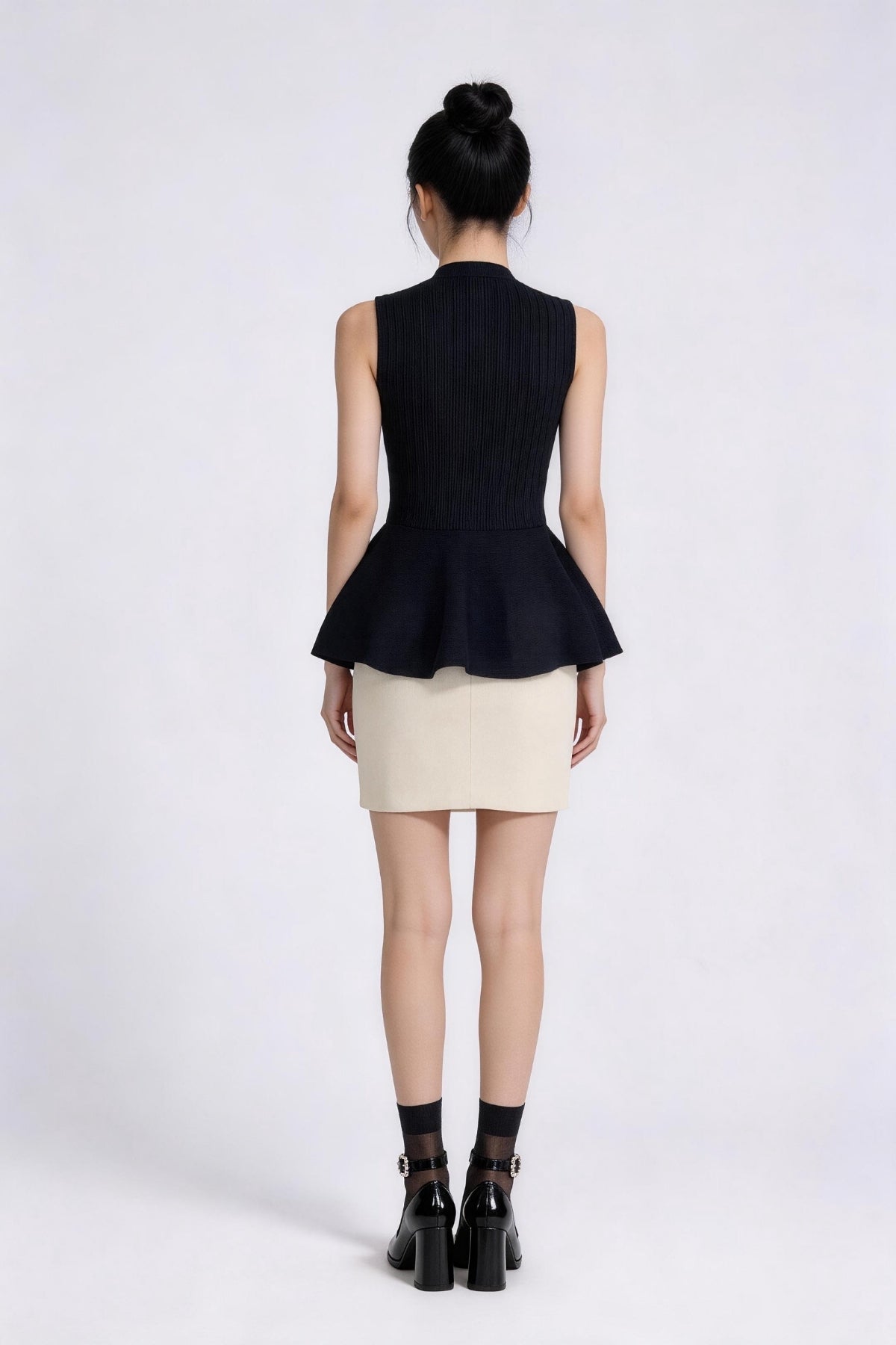 Lunessa Ribbed Peplum Top